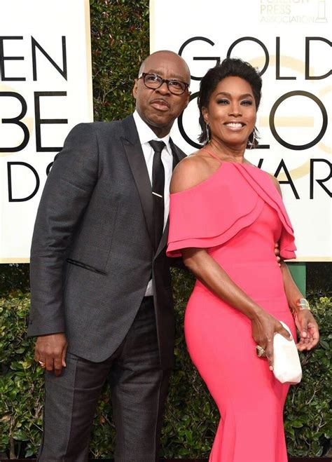 courtney b vance with wife angela bassett christian siriano gown at the 74th annual golden