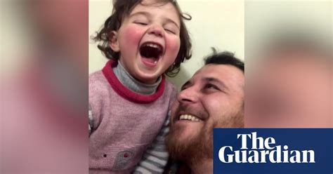 Syrian Father Teaches Daughter To Cope With Shelling Noise Through