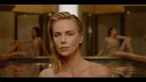Charlize Theron Walking Naked Out Of A Pool Is What Female Empowerment Looks Like In Diors