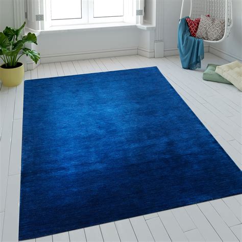 Wählen sie aus illustrationen zum thema blaue teppiche von istock. Wollteppich Einfarbig Blau Handgefertigt | Teppich.de