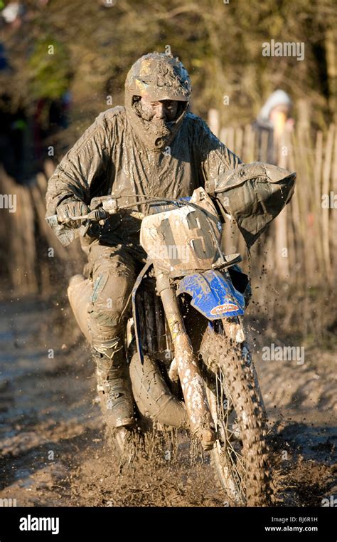 Motocross Bike Rider Covered In Mud Stock Photo Alamy