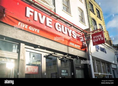 London- January 2023: Five Guys burger restaurant on Portobello Road