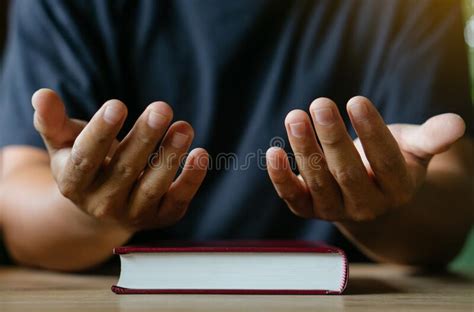 Hands Of Man With Bible Prayingchristian Life Prayer To God Man Pray