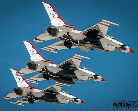 Usaf Thunderbirds In Tight Formation With Afterburners Lit