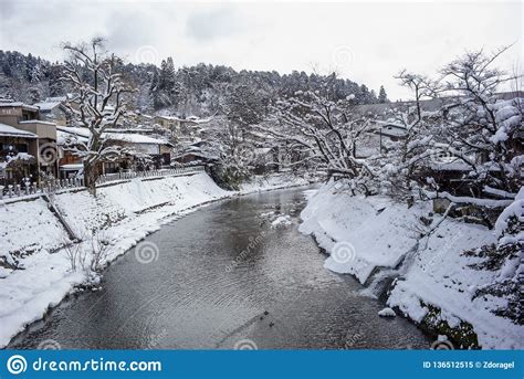 Beautiful View of Miyagawa River Cover with Snow and Vintage Buildings ...