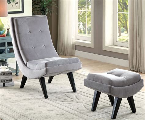 The chair favors understated lines over embellishment, for a timeless look rendered in graphite powder coated aluminum. Esmeralda Gray Accent Chair With Ottoman from Furniture of America | Coleman Furniture
