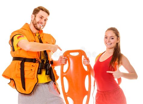 Lifeguards In Life Vest With Rescue Buoy Stock Image Image Of Guard