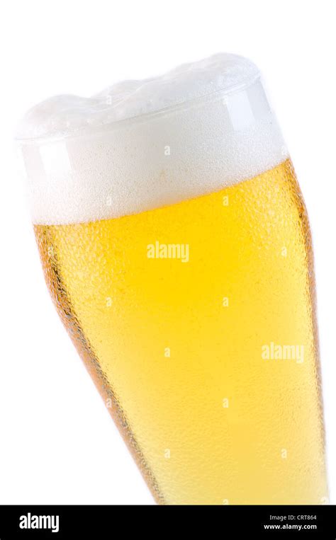 Beer Into Glass Isolated On White Stock Photo Alamy