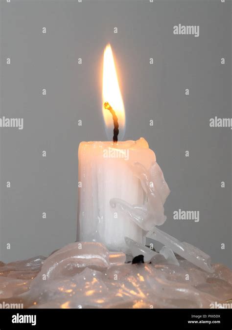 White Melting Candle Hi Res Stock Photography And Images Alamy