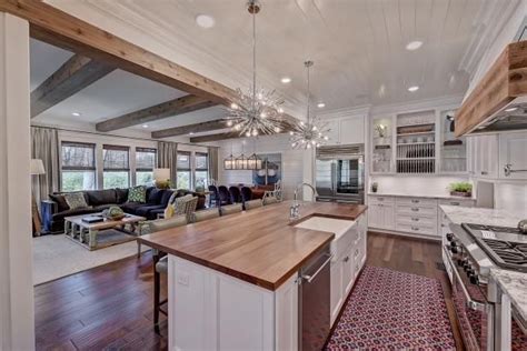 Open Concept Farmhouse With An Open Plan Kitchen And Butcher Block