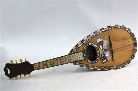 An Italian Rosewood Mandolin Inlaid With Mother Of Pearl And