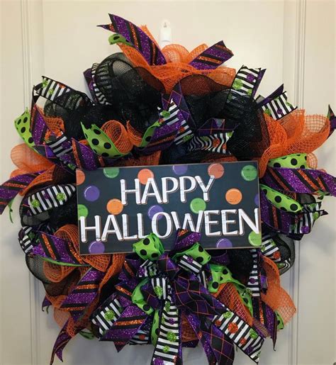 A Happy Halloween Wreath With Black And Purple Mesh Orange And Green