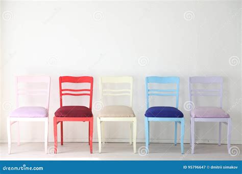 White Room With Colorful Chairs Blue Yellow Red Blue Purple Stock Image