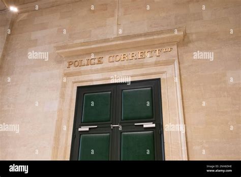 police correctionnelle text on ancient wall facade building means in