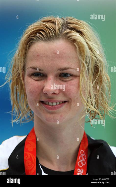 Germanys Britta Steffen After Receiving Her Gold Medal After The Womens 100m Freestyle Final