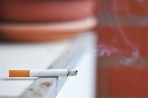 Lit Cigarette Stock Photo Image 14357240