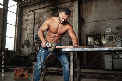 Muscled Half Naked Man At Work In An Old Factory Stock Photo Adobe Stock