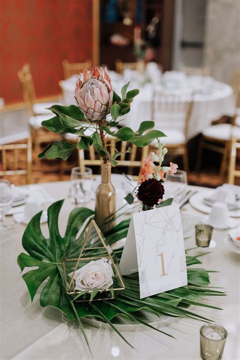 Modern Centerpieces With Protea Table Number And Vase Tropical