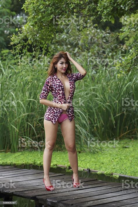 Beautiful Sexy Asian Girl Posing Topless Outdoors Stock