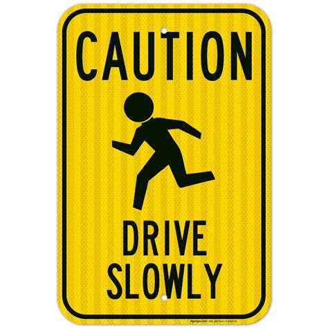 Caution Drive Slowly Sign With Symbol