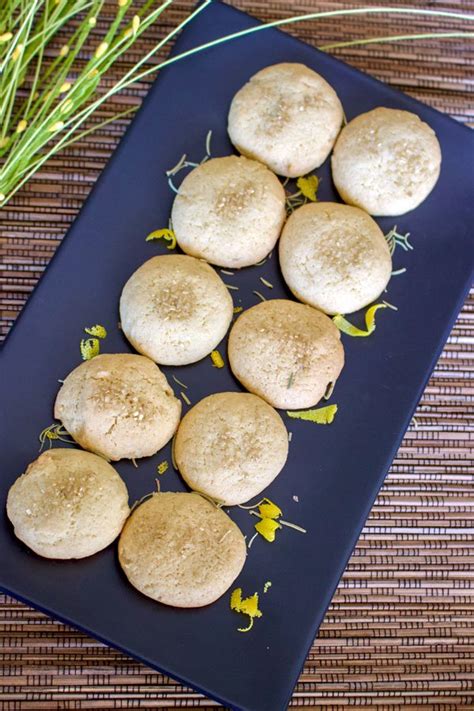 Form dough into small balls (about 1 tbsp.), and drop into a bowl of. Olive Oil Lemon Cookies With Herbs