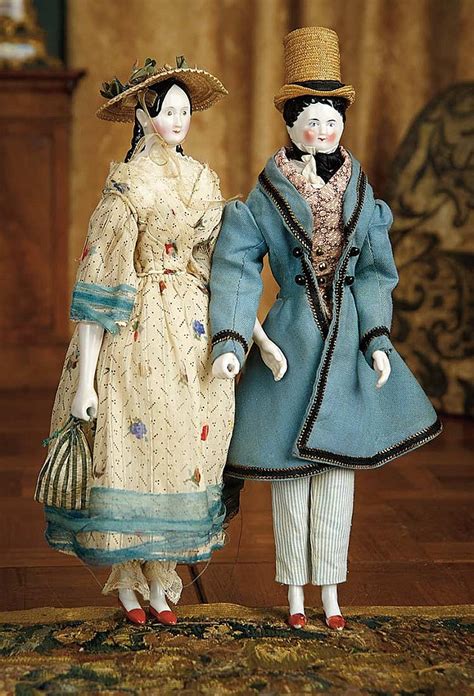 Pair Of German Porcelain Dolls Fully Articulated Wooden Bodies