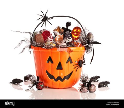 Trick Or Treat Halloween Bucket Filled With Candies And Spiders On