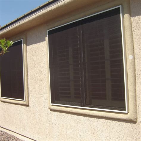 The inlet vent tabs screwed down into the underlying plywood strip and capturing the three layers of screen. Golf Ball Screens | Atomic Solar Screens