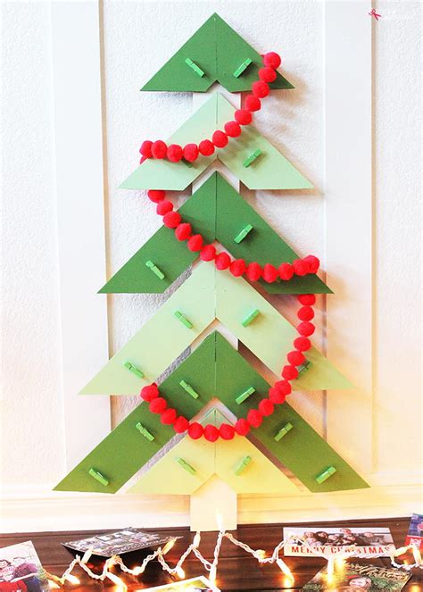They're perfect as tropical accents on a summertime table setting. Modern Christmas Tree DIY Card Holder | AllFreeChristmasCrafts.com