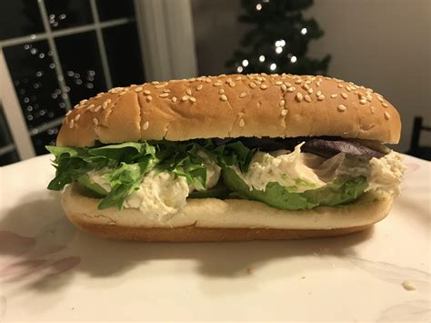 Gourmet Chicken Salad Sandwich With Artisan Greens Avocado And Herb