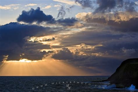 Storm Clouds Sunset Sun Beams Ocean Photo Information
