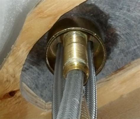 I just removed an old kitchen sink with the exact same faucet. Loose Faucet - DoItYourself.com Community Forums
