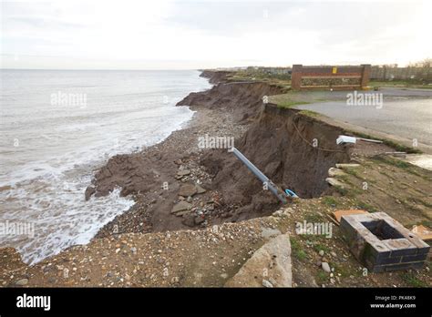 Coastal Erosion Cliffs Remains Of A Caravan Site That Has Collapsed
