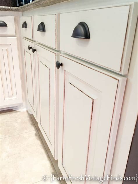 Transform your basic builder cabinets into a distressed finish looks good with any color depending on the look you're trying to achieve, but black and white tend to be the most popular. Kitchen Cabinet Refacing on a Budget - Farm Fresh Vintage ...