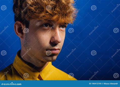 Close Up Serious Guy In Yellow Shirt Young Guy Stock Image Image