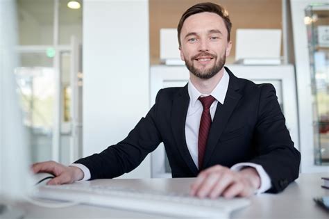 Premium Photo Handsome Business Manager At Desk