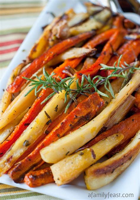 Roasted with garlic and herbs this is an amazing dish for the holidays. Roasted Carrots and Parsnips - A simple, delicious and ...