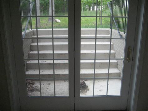 If a window is more than 44 inches from the ground, a ladder or steps at least 12 inches wide must be present. Basement exit options | Walk-up basement exit photo IMG ...