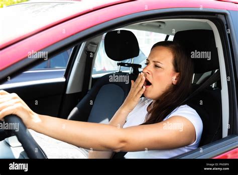 Female Car Driver Yawning Hi Res Stock Photography And Images Alamy