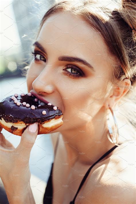 Portrait Of Funny Beautiful Girl Eating Donut Containing Girl Donut And Food Images