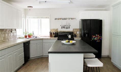 Two and a half years ago, i painted our oak kitchen cabinets white and it completely transformed our kitchen. Our Painted Kitchen Cabinets! - Chris Loves Julia