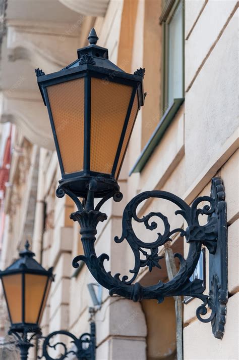 Premium Photo Old Street Lantern Lighting On Facade Of Building