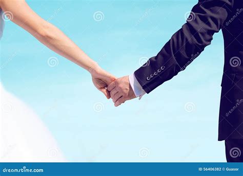 Beautiful Wedding Couple Bride And Groom Holding Hands Looking Stock