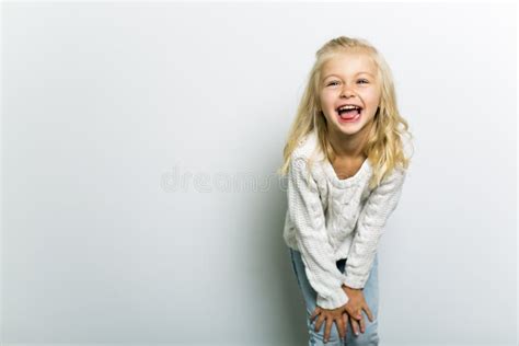 A Cute Girl 5 Year Old Posing In Studio Stock Photo Image Of Laugh