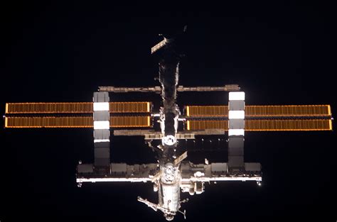 Nadar View Of The Iss As The Orbiter Discovery Moves In For Docking