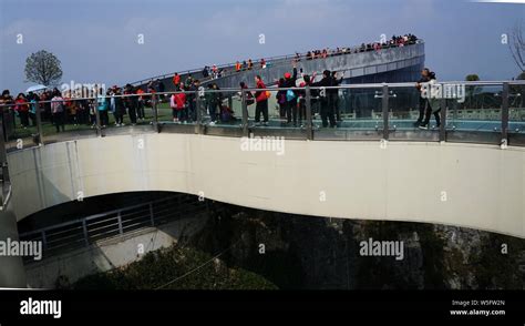 People Visit The Chongqing Galss Bottomed Cantilever Bridge Known As