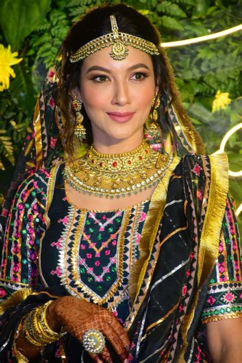 gauahar khan looks beautiful in traditional yellow attire at her mehendi ceremony see inside