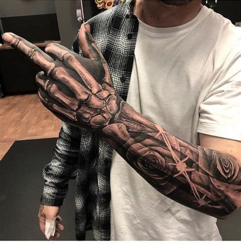 40 Skeleton Hand Tattoo Ideas That Look Cool Tattootab