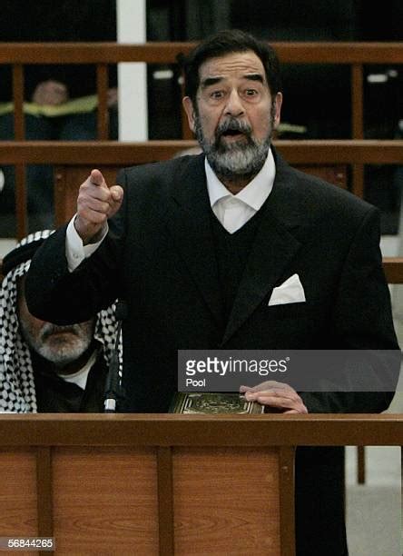 Saddam Hussein Ordered Back Into Court Photos And Premium High Res