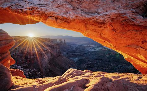Sunrise At Mesa Arch In Canyonlands National Park In Utah Photograph By